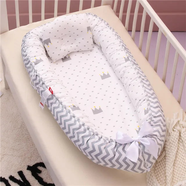 Nid bébé douillet avec oreiller – Berceau portable et sécurisant