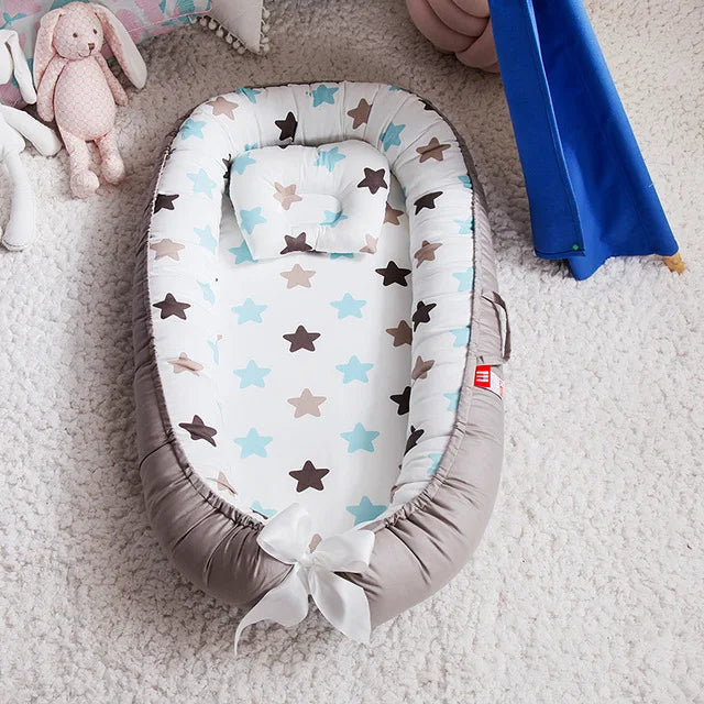 Nid bébé douillet avec oreiller – Berceau portable et sécurisant