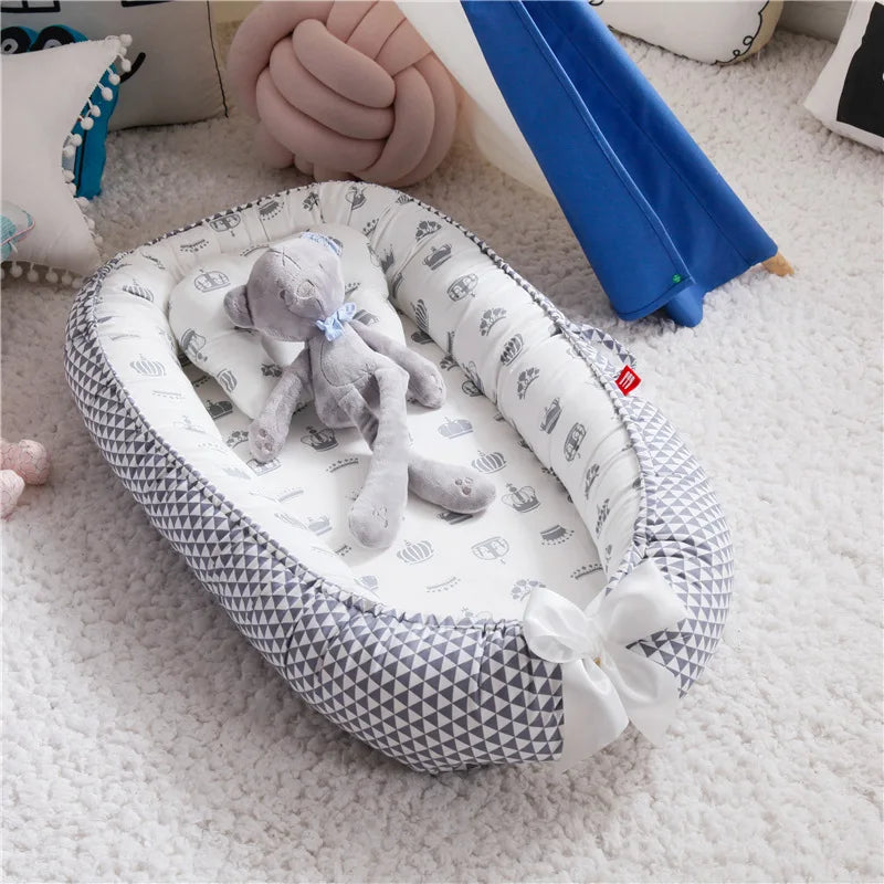 Nid bébé douillet avec oreiller – Berceau portable et sécurisant