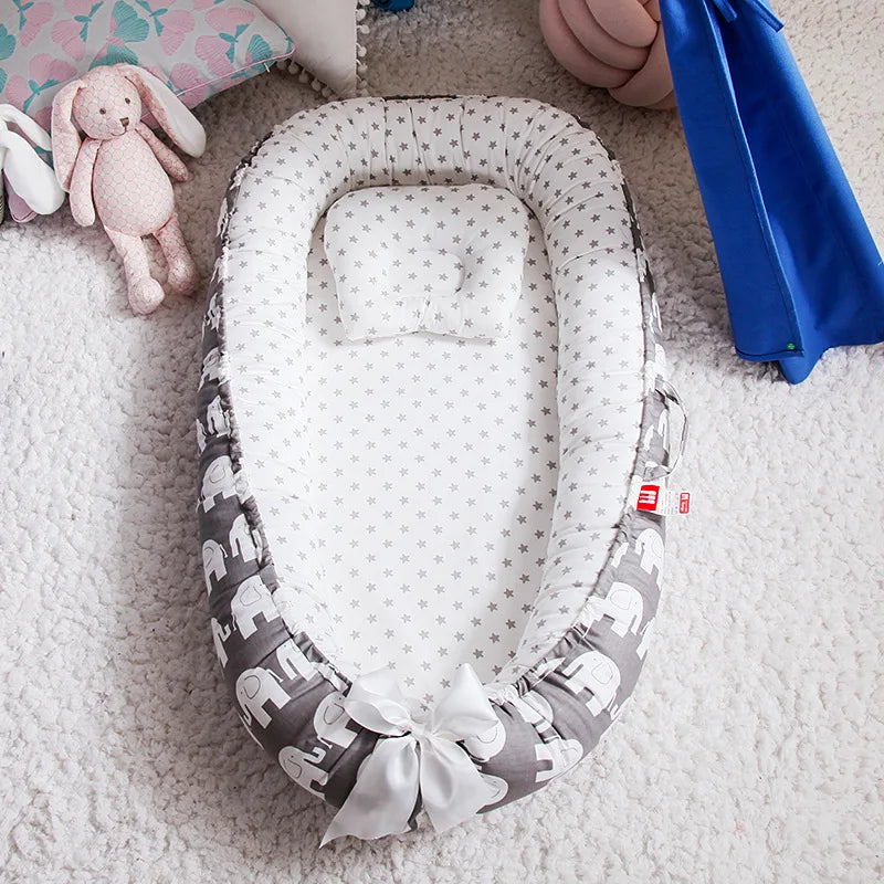 Nid bébé douillet avec oreiller – Berceau portable et sécurisant