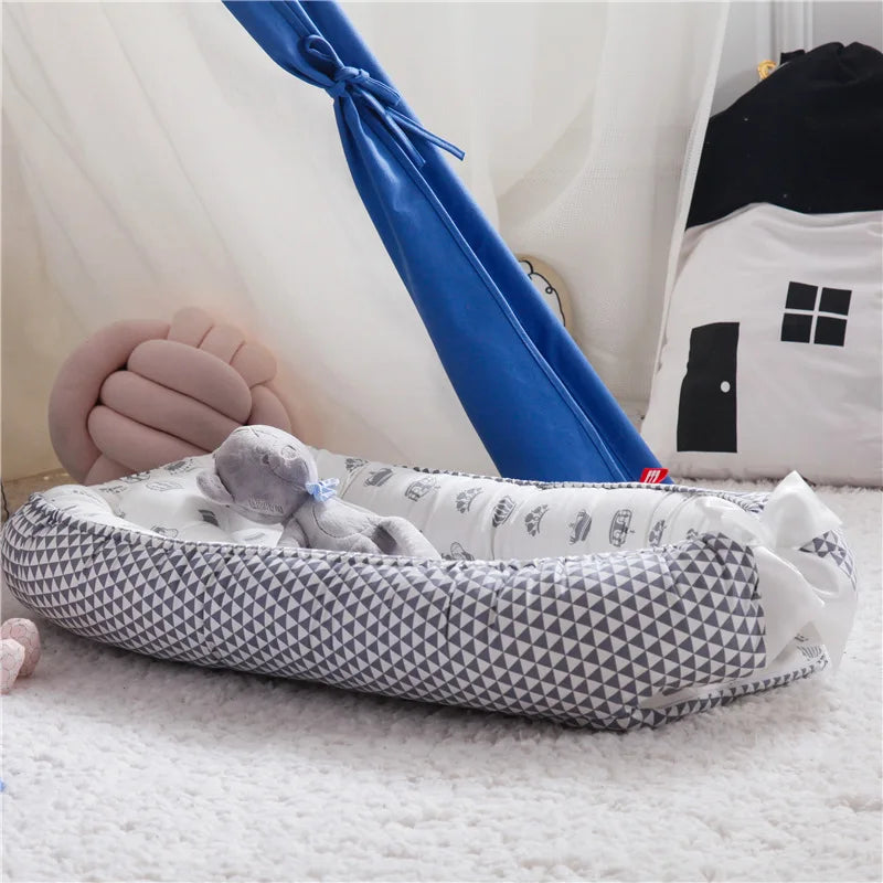 Nid bébé douillet avec oreiller – Berceau portable et sécurisant