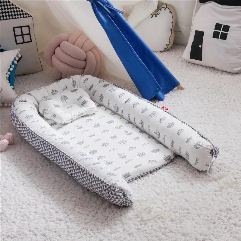 Nid bébé douillet avec oreiller – Berceau portable et sécurisant