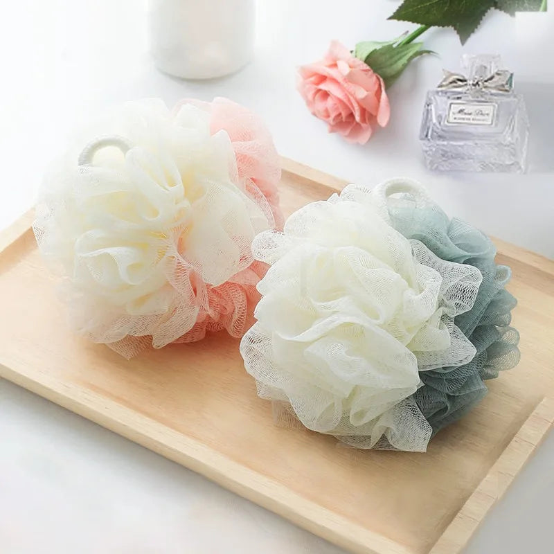 3 Fleurs de douche bicolores en filet doux